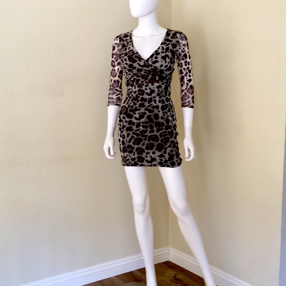 Bebe Mesh faux printed wrap dress